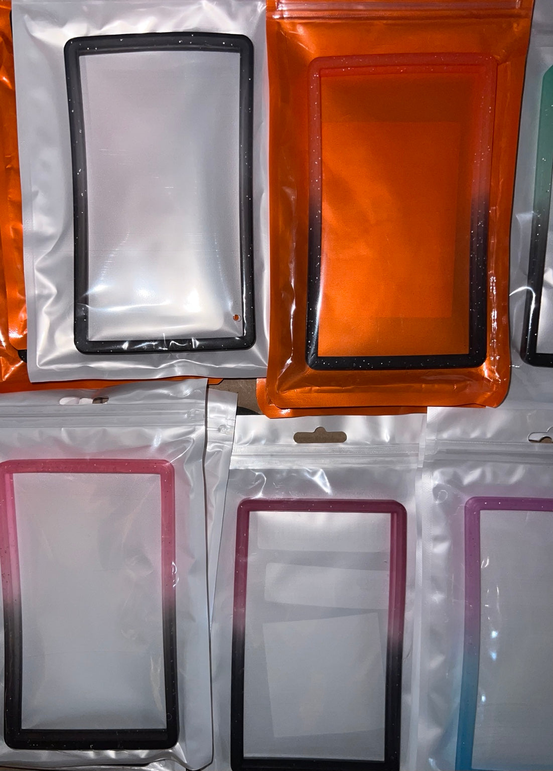 PSA graded card bumper cases showing gradient color variants